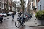 Amsterdam 19 april 2013
Ajax speler Christian Poulsen met zijn vrouw op de cornelis schuytstraat.
Peter Smulders bv