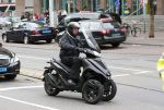 Amsterdam 16 mei 2013
Willem Holleeder rijdt voorbij het paleis op de dam op zijn piaggio MP3.
Peter Smulders bv