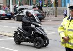 Amsterdam 16 mei 2013
Willem Holleeder rijdt voorbij het paleis op de dam op zijn piaggio MP3.
Peter Smulders bv