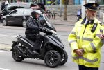 Amsterdam 16 mei 2013
Willem Holleeder rijdt voorbij het paleis op de dam op zijn piaggio MP3.
Peter Smulders bv