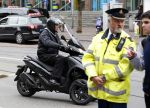 Amsterdam 16 mei 2013
Willem Holleeder rijdt voorbij het paleis op de dam op zijn piaggio MP3.
Peter Smulders bv