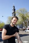 Amsterdam 15 april 2015
Dave en Dries Roelvink metselen een steen met daarop hun naam in de Westertoren. Dave heeft een tatoo van de westertoren op zijn arm staan.