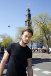 Amsterdam 15 april 2015
Dave en Dries Roelvink metselen een steen met daarop hun naam in de Westertoren. Dave heeft een tatoo van de westertoren op zijn arm staan.