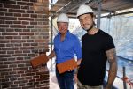 Amsterdam 15 april 2015
Dave en Dries Roelvink metselen een steen met daarop hun naam in de Westertoren. Dave heeft een tatoo van de westertoren op zijn arm staan.