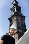 Amsterdam 15 april 2015
Dave en Dries Roelvink metselen een steen met daarop hun naam in de Westertoren. Dave heeft een tatoo van de westertoren op zijn arm staan.