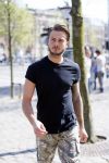 Amsterdam 15 april 2015
Dave en Dries Roelvink metselen een steen met daarop hun naam in de Westertoren. Dave heeft een tatoo van de westertoren op zijn arm staan.