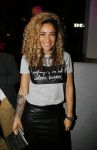 Rotterdam 9 april 2015
Fajah Lourens met haar nieuwe vriend bij de opening van de nieuwe zaak waar Winston Post de manager is in het Hilton Hotel.