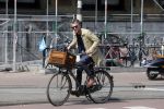 Amsterdam 23 april 2015  
Jos v Raak op de fiets bij ihet Paleis op de Dam.