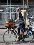 Amsterdam 23 april 2015  
Jos v Raak op de fiets bij ihet Paleis op de Dam.