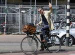 Amsterdam 23 april 2015  
Jos v Raak op de fiets bij ihet Paleis op de Dam.