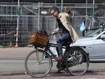 Amsterdam 23 april 2015  
Jos v Raak op de fiets bij ihet Paleis op de Dam.
