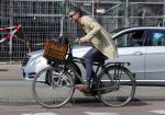 Amsterdam 23 april 2015  
Jos v Raak op de fiets bij ihet Paleis op de Dam.
