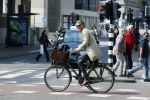 Amsterdam 23 april 2015  
Jos v Raak op de fiets bij ihet Paleis op de Dam.