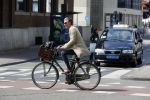 Amsterdam 23 april 2015  
Jos v Raak op de fiets bij ihet Paleis op de Dam.