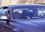 Amsterdam 30 april 2015  
Koen Verweij met (een) vriendin in zijn bmw cabrio en op straat