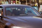 Amsterdam 30 april 2015  
Koen Verweij met (een) vriendin in zijn bmw cabrio en op straat