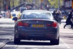 Amsterdam 30 april 2015  
Koen Verweij met (een) vriendin in zijn bmw cabrio en op straat