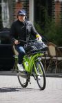Amsterdam 28 april 2015  
Marc-Marie Huijbregts op de fiets in amsterdam