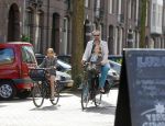 Amsterdam 21 april 2015  
Patrick Stoof met dochter op de fiets.