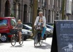 Amsterdam 21 april 2015  
Patrick Stoof met dochter op de fiets.