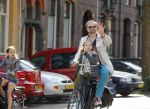 Amsterdam 21 april 2015  
Patrick Stoof met dochter op de fiets.
