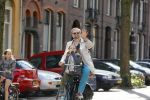 Amsterdam 21 april 2015  
Patrick Stoof met dochter op de fiets.
