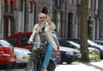 Amsterdam 21 april 2015  
Patrick Stoof met dochter op de fiets.
