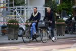 Amsterdam 28 april 2015
Rolf Snoeren (Viktor&Rolf) met zijn partner fietsend door amsterdam