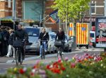 Amsterdam 28 april 2015
Rolf Snoeren (Viktor&Rolf) met zijn partner fietsend door amsterdam