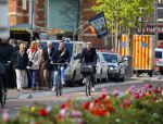 Amsterdam 28 april 2015
Rolf Snoeren (Viktor&Rolf) met zijn partner fietsend door amsterdam