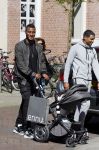 Amsterdam 14 april 2015
Sunnery James en zijn moeder met vrienden achter de kinderwagen op de cornelis schuytstraat