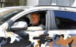 Amsterdam 23 april 2016 
Gordon met zijn audi Q7 in camouflage kleuren in Amsterdam zuid.