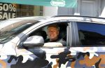 Amsterdam 23 april 2016 
Gordon met zijn audi Q7 in camouflage kleuren in Amsterdam zuid.