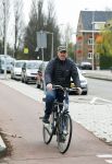 Amsterdam 18 april 2016 
Henk Poort op de fiets in Amsterdam.