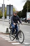 Amsterdam 18 april 2016 
Henk Poort op de fiets in Amsterdam.