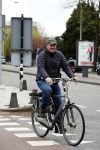 Amsterdam 18 april 2016 
Henk Poort op de fiets in Amsterdam.