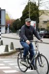 Amsterdam 18 april 2016 
Henk Poort op de fiets in Amsterdam.
