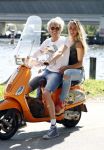 Amsterdam 7 mei 2016 
Michelle van Nood en haar vriend Koen Brouwer op hun vespa scooter. Michelle en Koen zijn de populaire deelnemers aan het RTL programma SOS survival of the Sexes