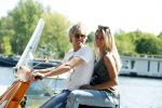 Amsterdam 7 mei 2016 
Michelle van Nood en haar vriend Koen Brouwer op hun vespa scooter. Michelle en Koen zijn de populaire deelnemers aan het RTL programma SOS survival of the Sexes