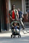 Amsterdam 7 mei 2016 
Sunnery James met zijn dochter Myllena Mae aan het wandelen.