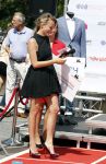 Amsterdam 12 mei 2016 
Tess Milne presenteert de business Run op de zuidas. De promotie dames zijn van Stella agency.