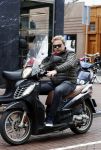 Amsterdam 16 april 2016
Wesly Bronkhorst op zijn scooter op de PC hooftstraat