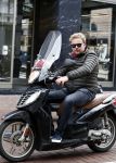 Amsterdam 16 april 2016
Wesly Bronkhorst op zijn scooter op de PC hooftstraat