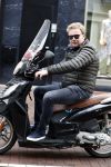Amsterdam 16 april 2016
Wesly Bronkhorst op zijn scooter op de PC hooftstraat