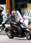 Amsterdam 16 april 2016
Wesly Bronkhorst op zijn scooter op de PC hooftstraat