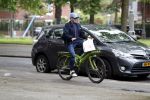 Amsterdam 13 mei 2017  
Marc Marie Huijbregts op zijn froene fiets in Amsterdam.