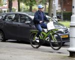 Amsterdam 13 mei 2017  
Marc Marie Huijbregts op zijn froene fiets in Amsterdam.