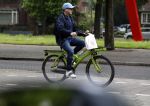Amsterdam 13 mei 2017  
Marc Marie Huijbregts op zijn froene fiets in Amsterdam.