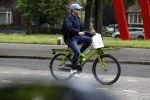 Amsterdam 13 mei 2017  
Marc Marie Huijbregts op zijn froene fiets in Amsterdam.