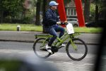 Amsterdam 13 mei 2017  
Marc Marie Huijbregts op zijn froene fiets in Amsterdam.